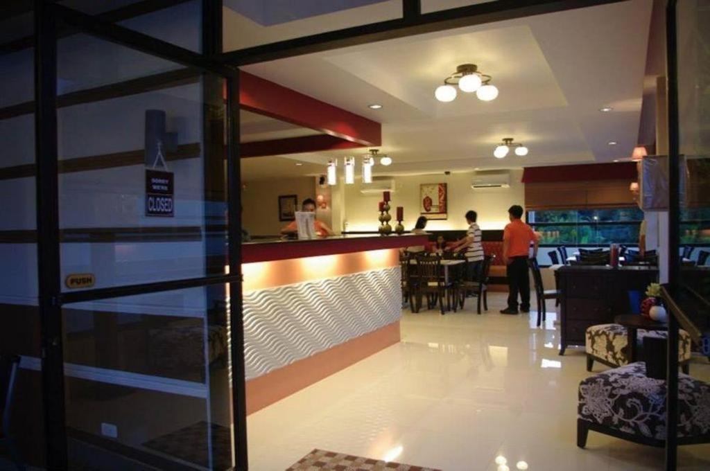 The Red Palm Suites And Restaurant Butuan City Esterno foto