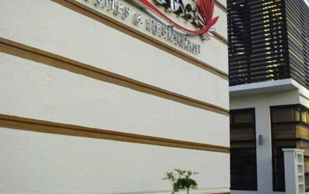 The Red Palm Suites And Restaurant Butuan City Esterno foto