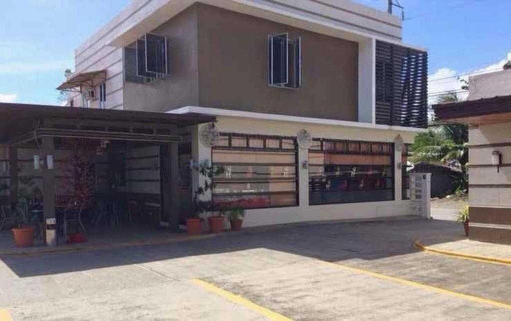 The Red Palm Suites And Restaurant Butuan City Esterno foto